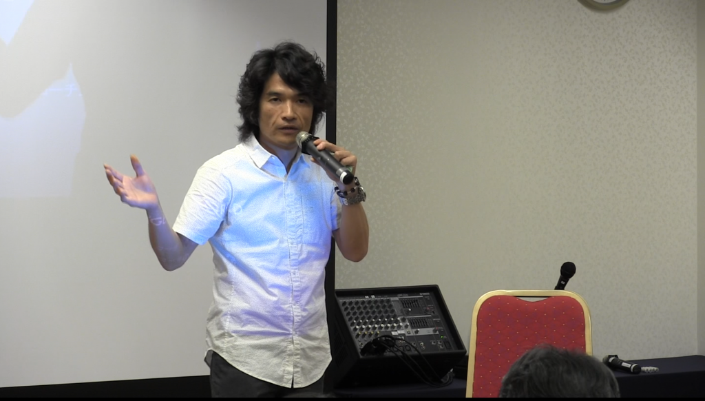 講演で話す原孝志